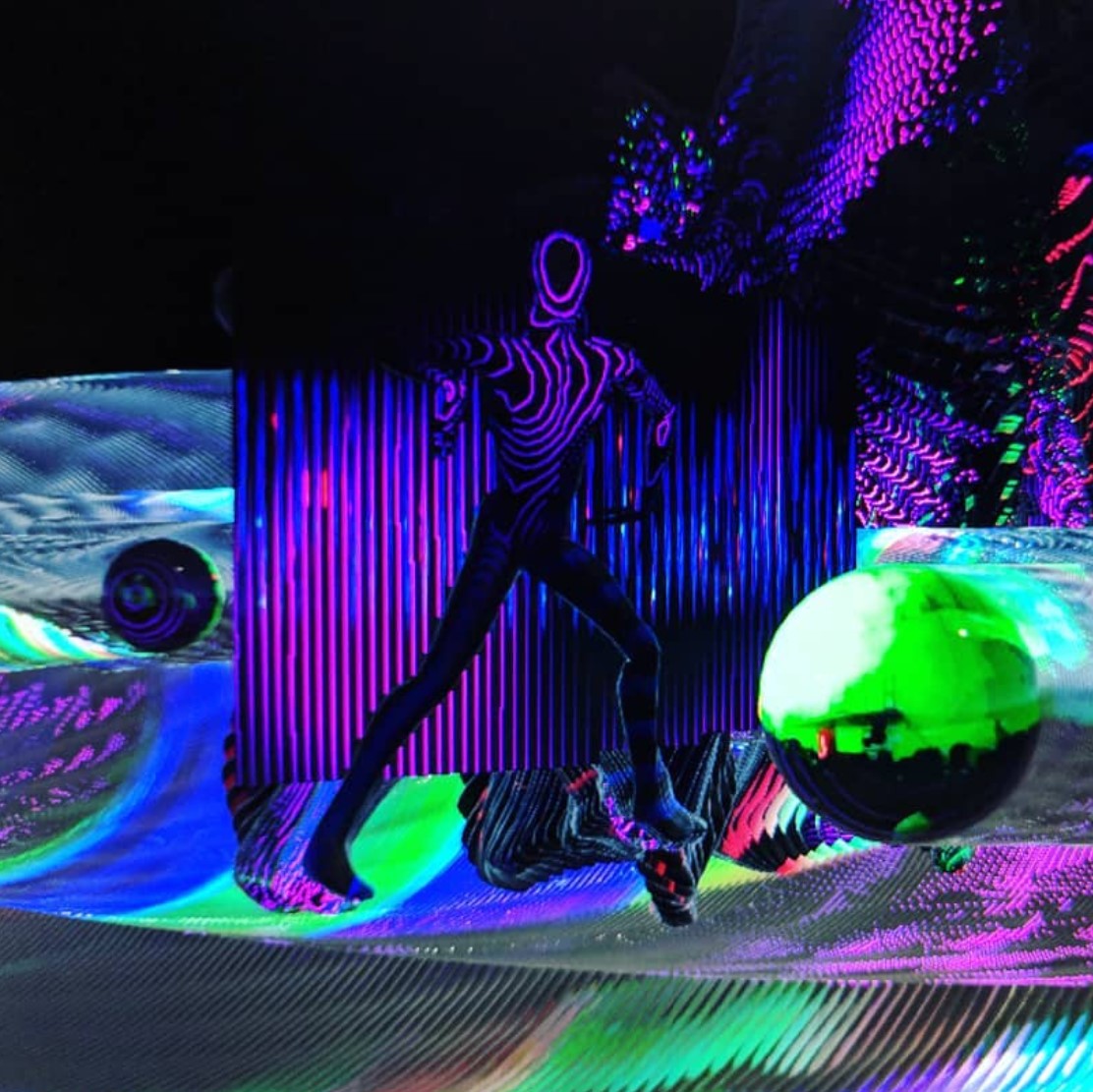 3D outline of a man dancing in a colorful abstract virtual landscape
